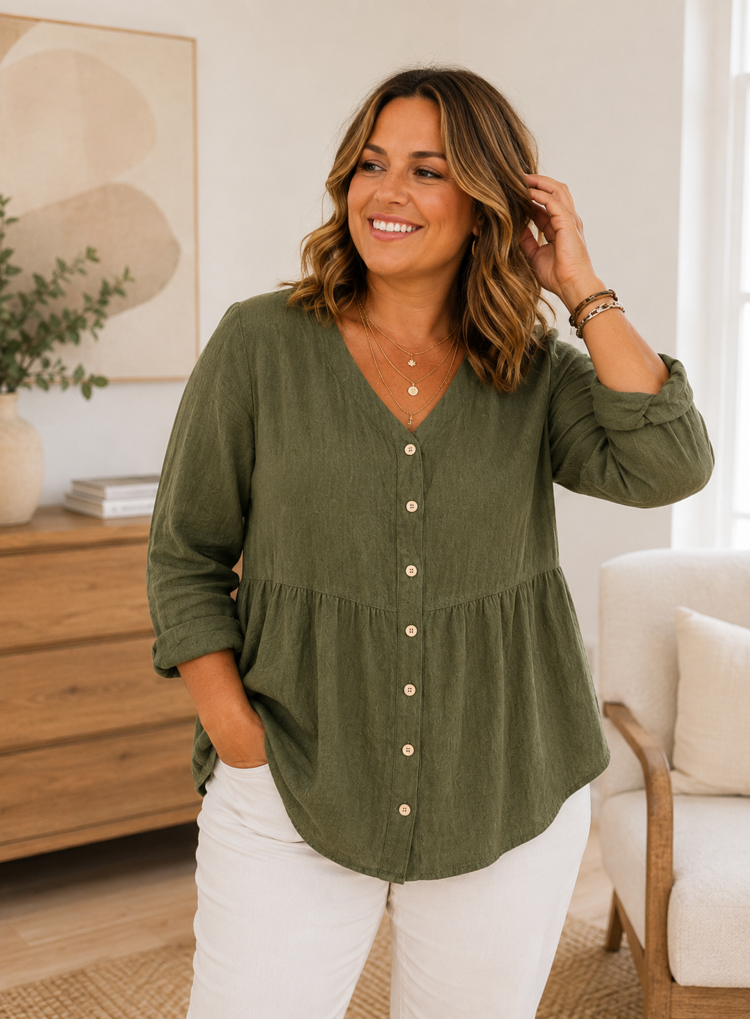 Jennifer wearing serene V-neck blouse